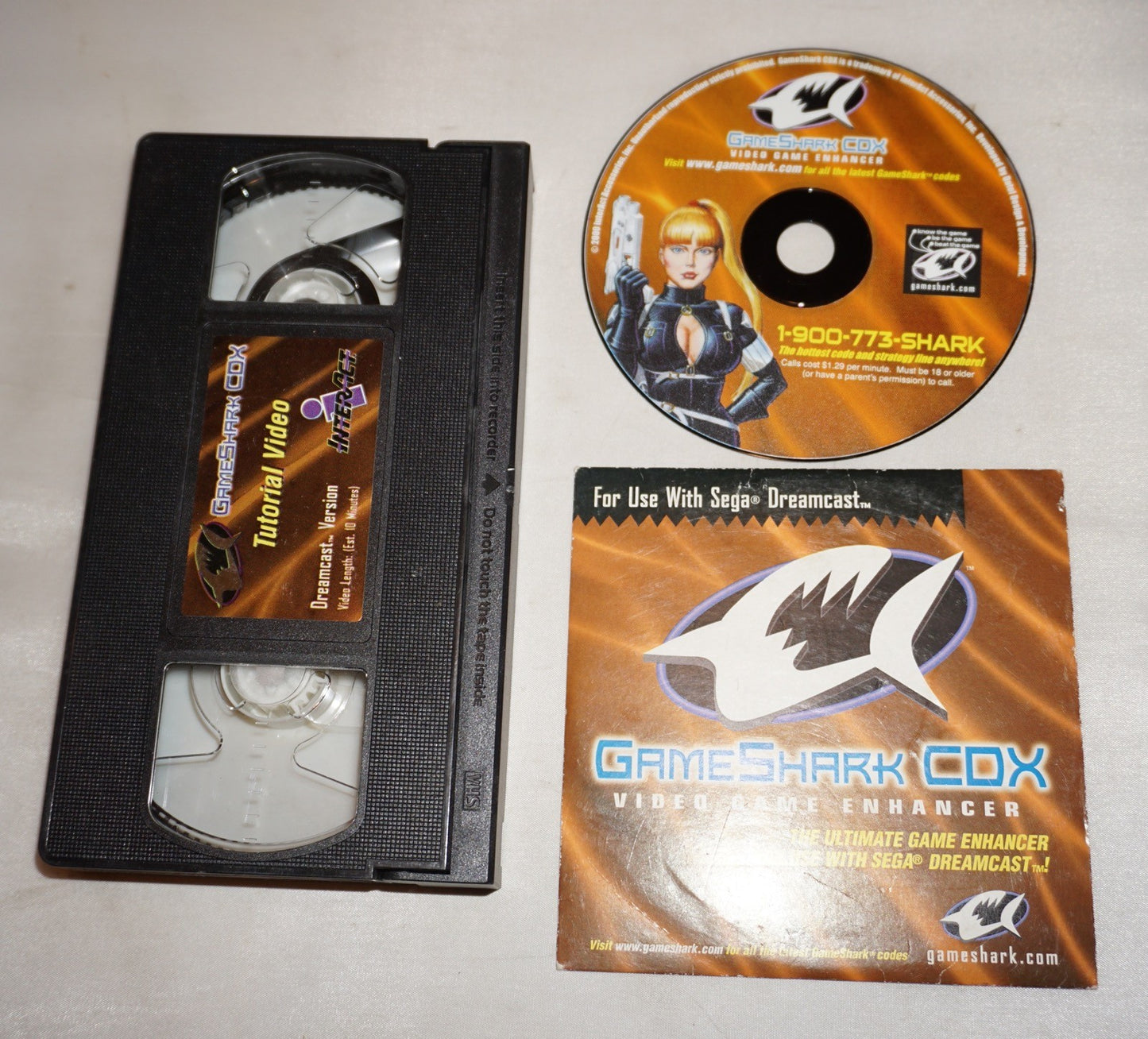 Gameshark CDX (Sega Dreamcast) with Sleeve & VHS